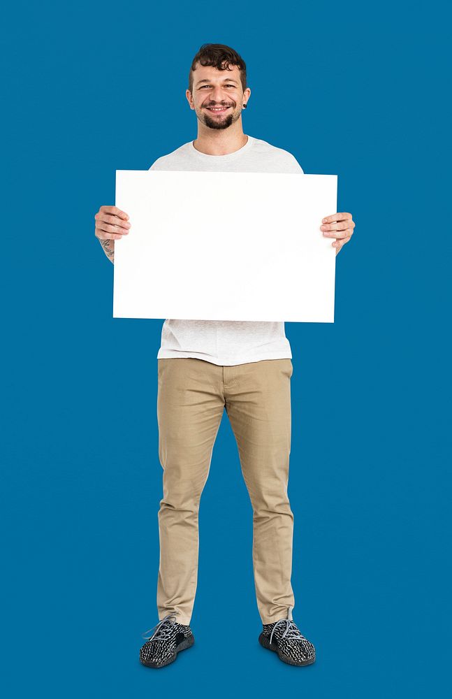 Adult Man Holding Blank Paper Board Studio Portrait