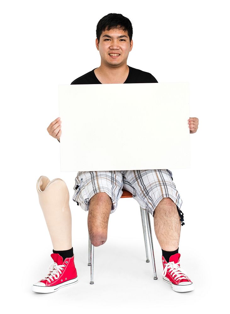 Asian disabled man holding empty board