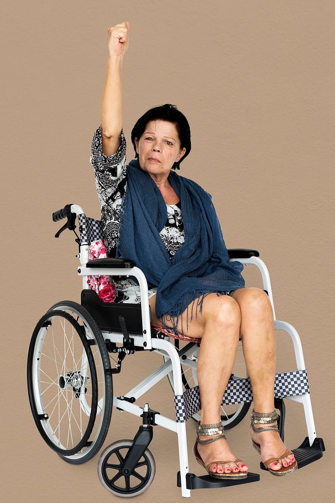 Disable Adult Woman Sitting on Wheelchair Studio Portrait