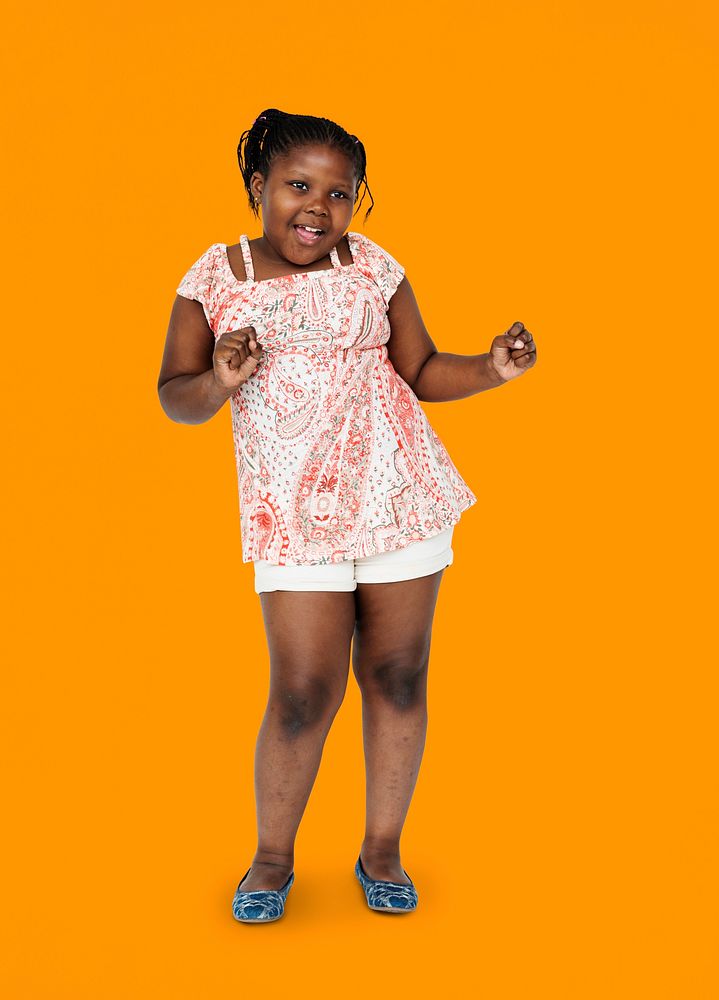 Little african girl having fun and dancing