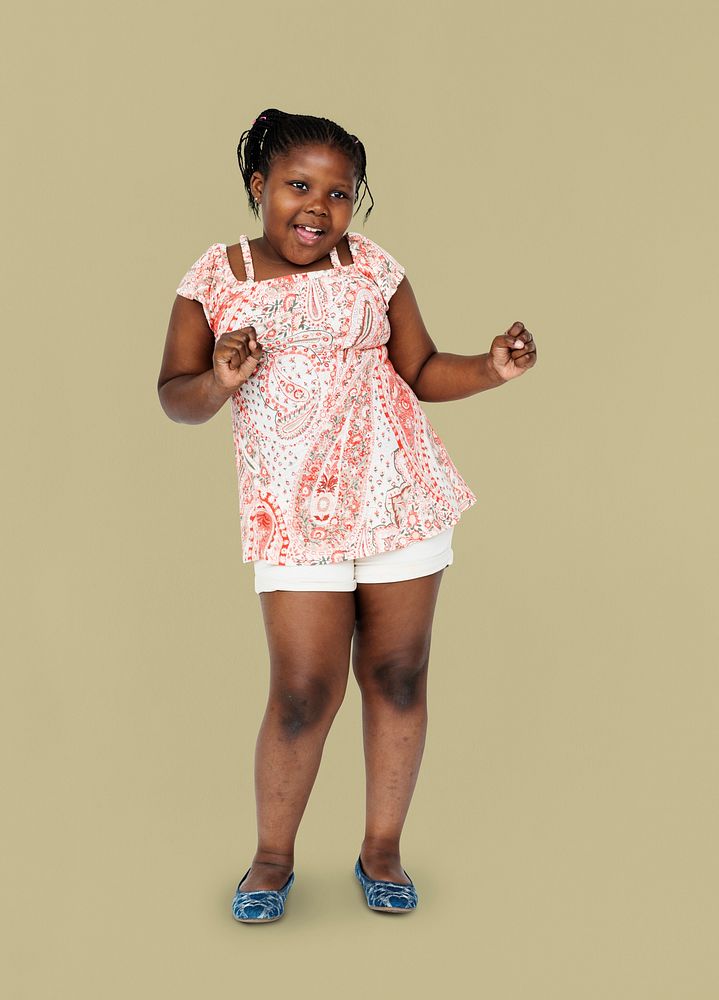 Little african girl having fun and dancing
