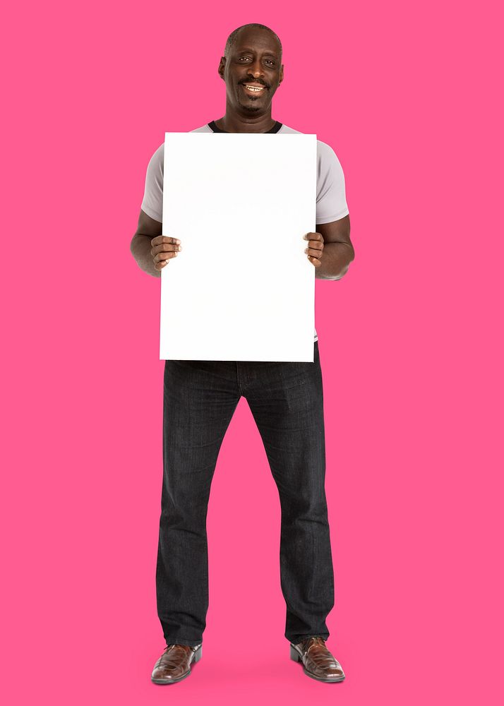 African descent man holding placard