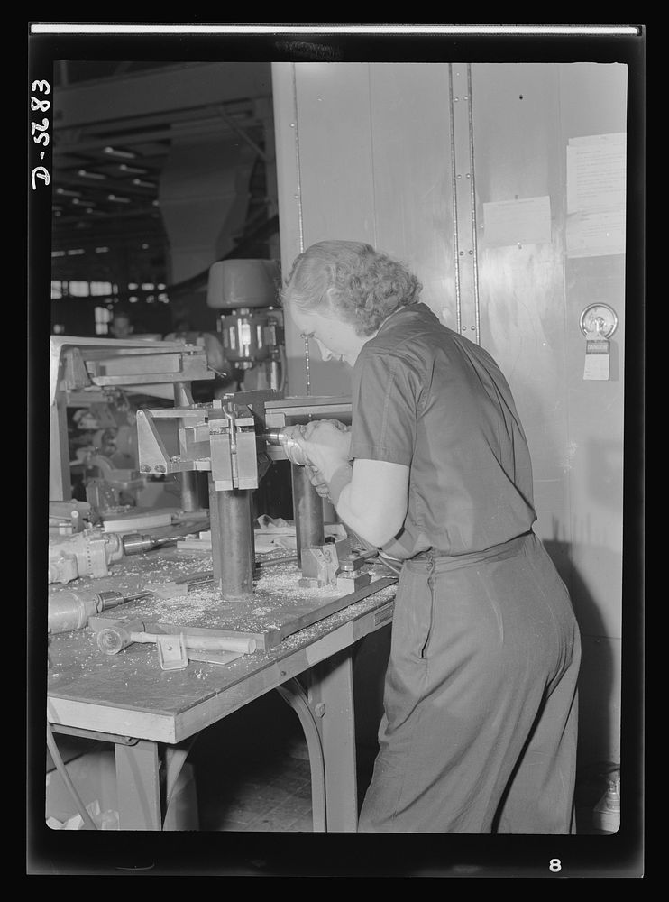 Production. Willow Run bomber plant. One of the many women employed at the giant Willow Run bomber plant operates a drill to…