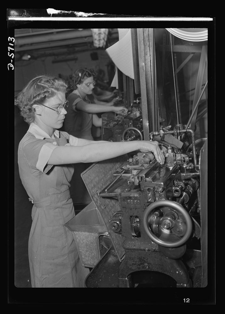 Women in industry. Tool  production. Arms for the love of America! The capable young woman whose strong hands guide this…