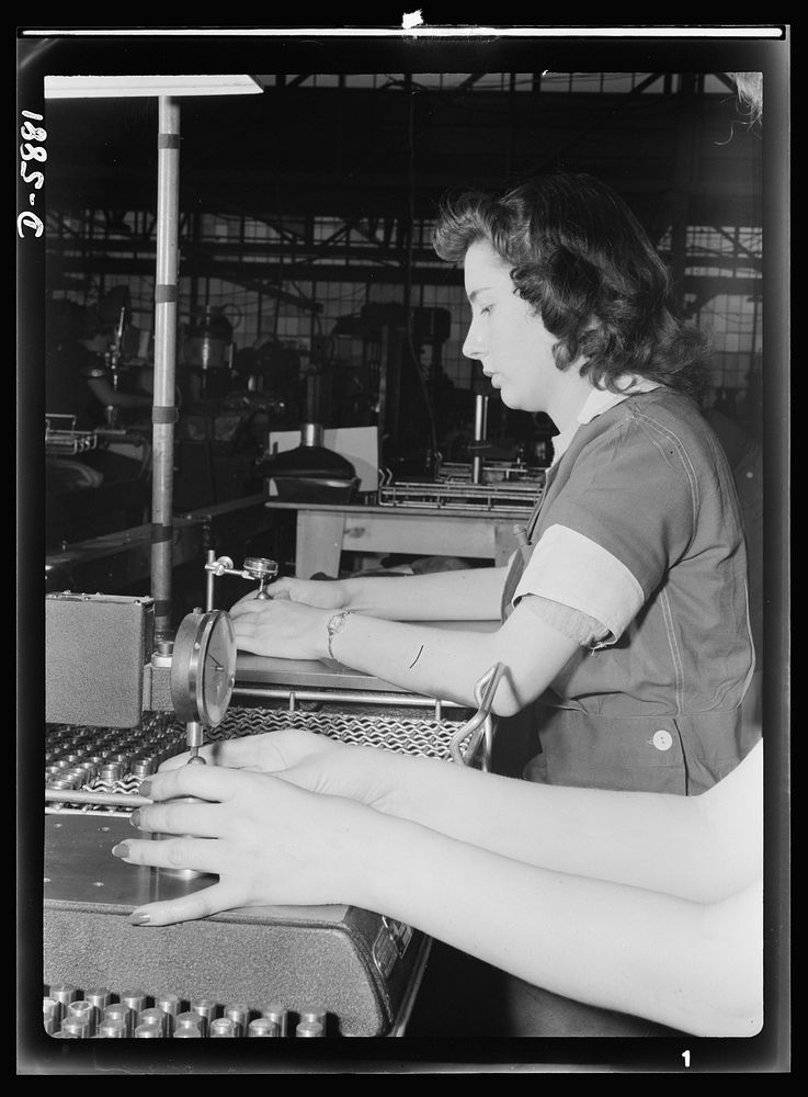 Women in industry. Aircraft motor workers. Scarlet fingernails give emphasis to the important work that feminine fingers are…