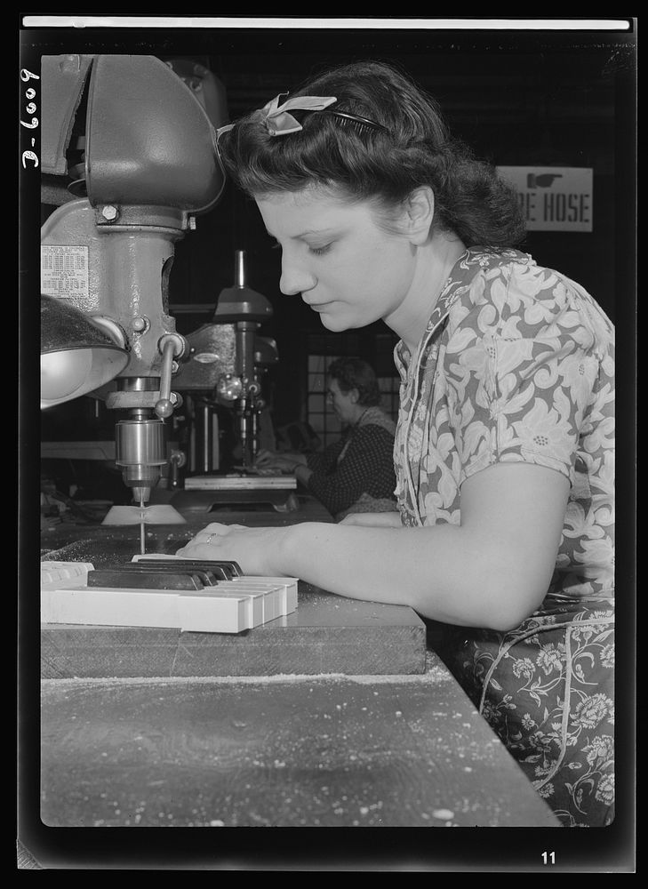 Conversion. Pianos to airplane motors. From piano keys to parts for trainer planes. Lorraine Avezzano, pictured at work in a…