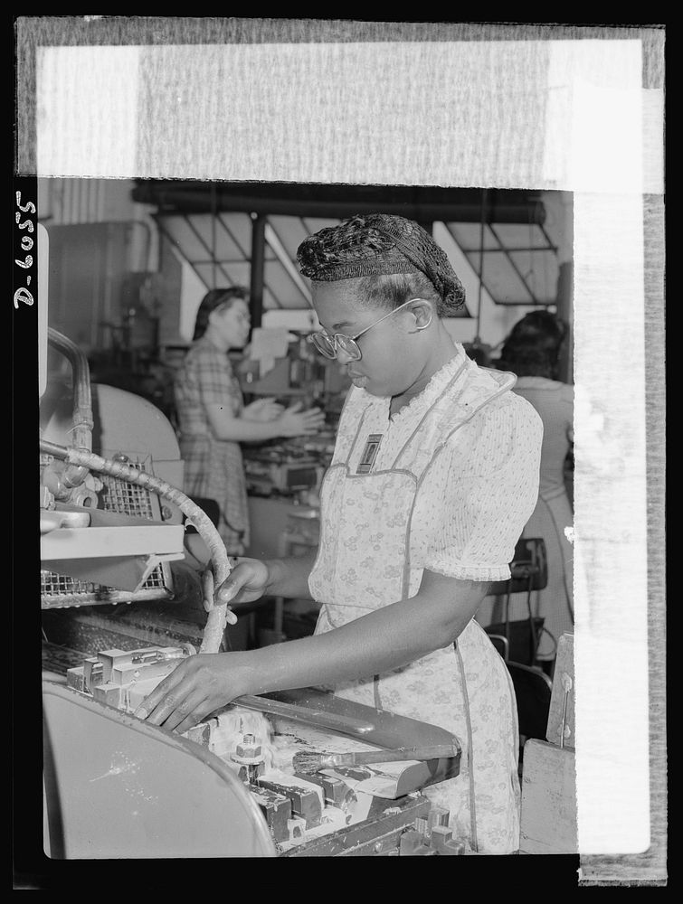 Women in war. Machine gun production operators. One of 2,000 women currently employed in a Midwest war plant, this young…
