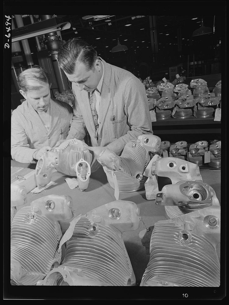 Production. Pratt and Whitney airplane engines. Cylinder heads for R-1340 Wasp planes are inspected in a large Eastern plant…