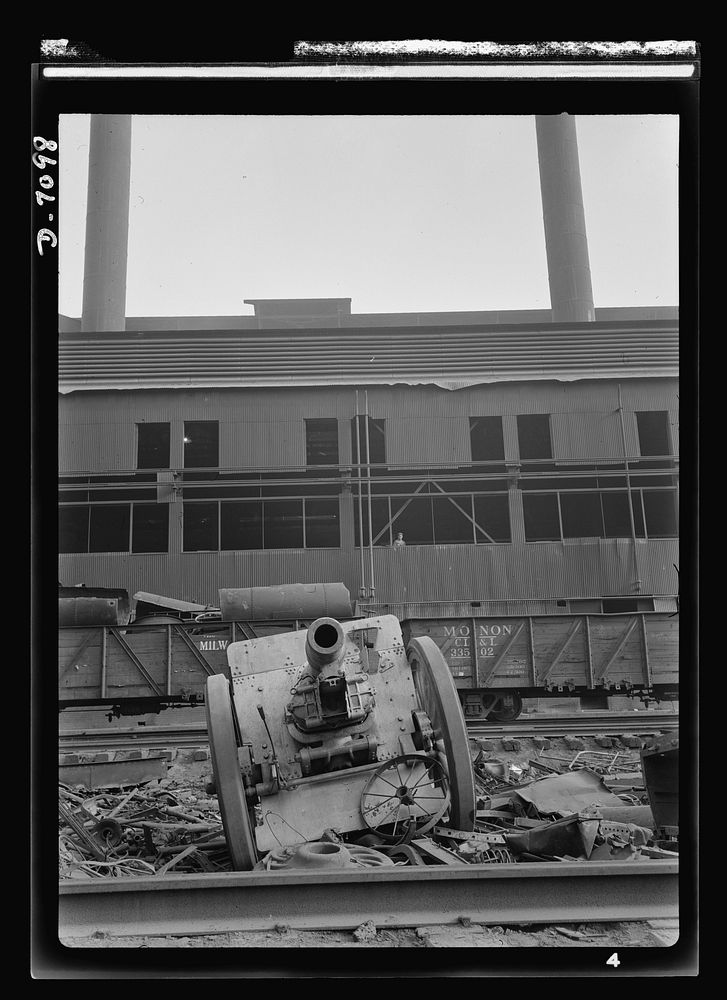 Salvage. Scrap for steel mills. A cannon that saw duty in World War I stands in the yard of a Chicago steel mill, ready to…