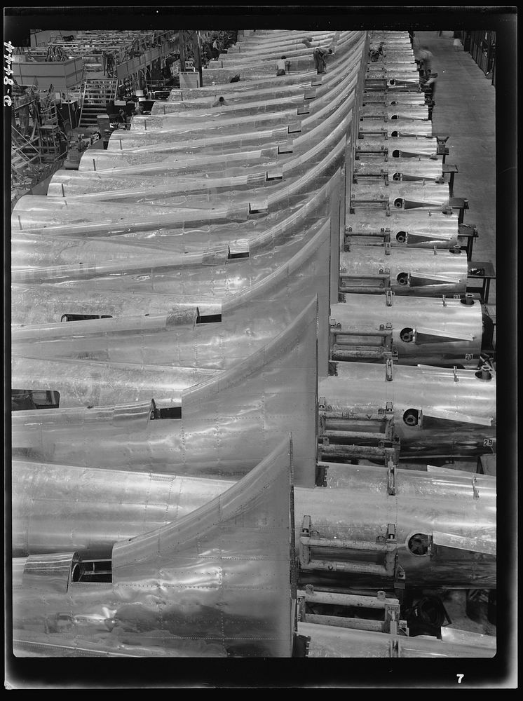 Production. B-17 heavy bomber. Tail sections of B-17F (Flying Fortress) bombers ready for assembly into the big warships of…