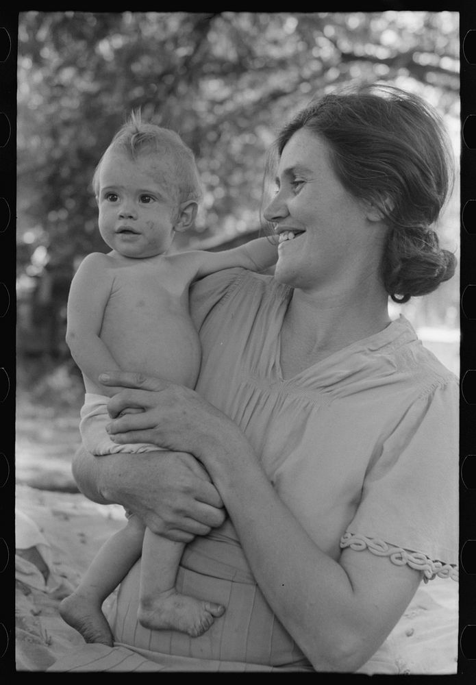 [Untitled photo, possibly related to: Wife of carpenter and her baby who live in community camp, Oklahoma City, Oklahoma] by…