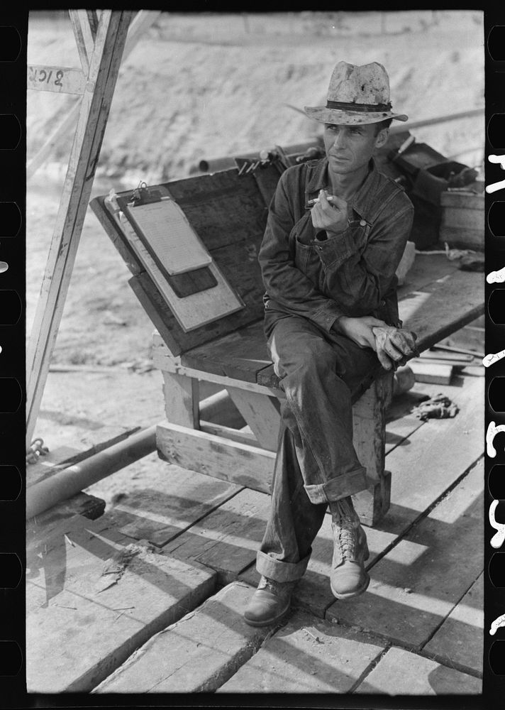 Oil field worker, Seminole oil field, Oklahoma by Russell Lee