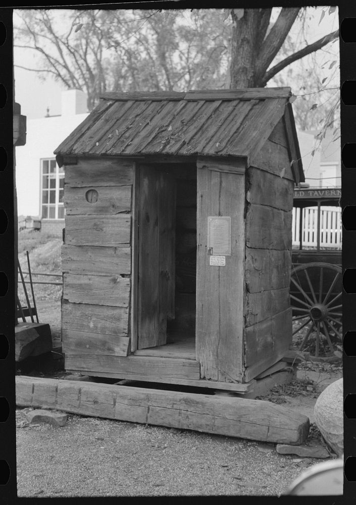 Old six-hole privy, historic relic at Wiggins Tavern, Northhampton, Massachusetts by Russell Lee