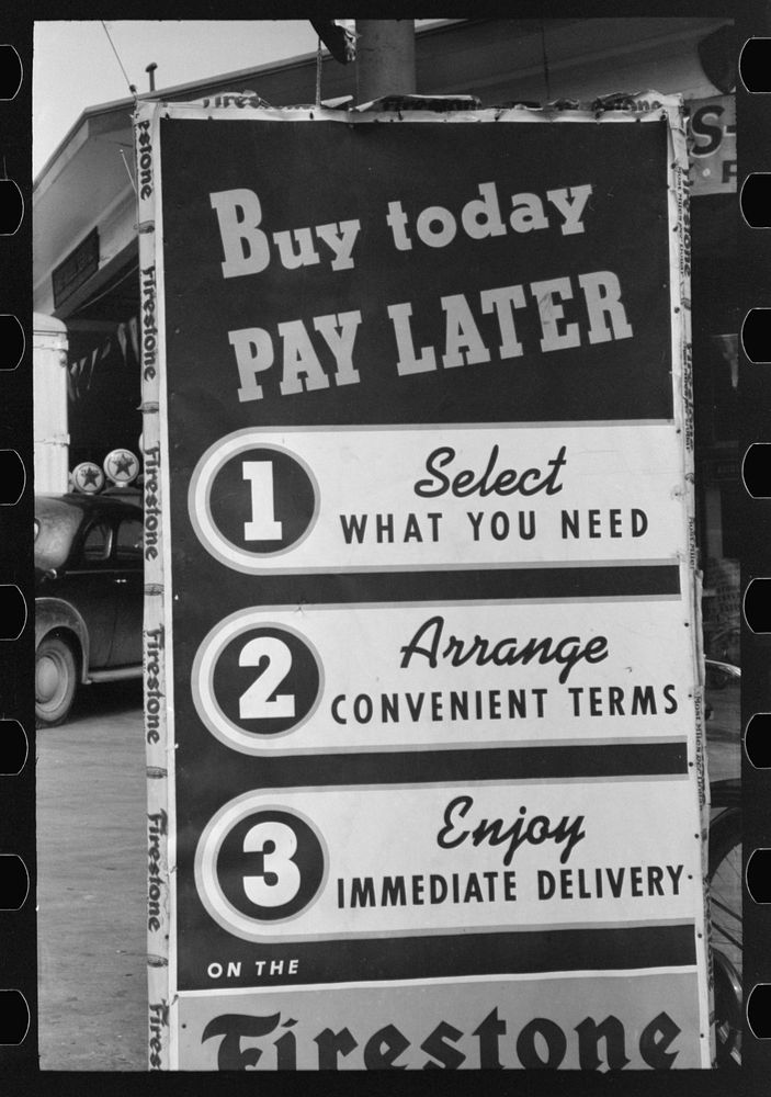 Sign illustrating installment buying, Waco, Texas by Russell Lee