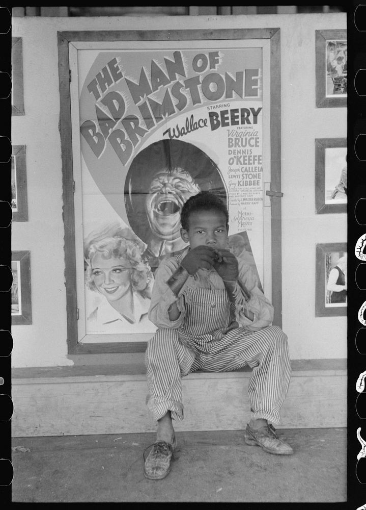 [Untitled photo, possibly related to: Man in front of movie theater, Waco, Texas] by Russell Lee