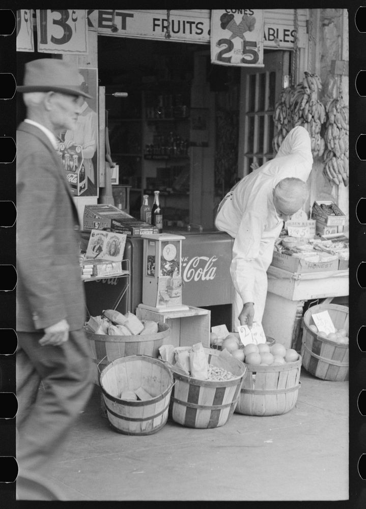 [Untitled photo, possibly related to: Proprietor of small store in market square, Waco, Texas] by Russell Lee