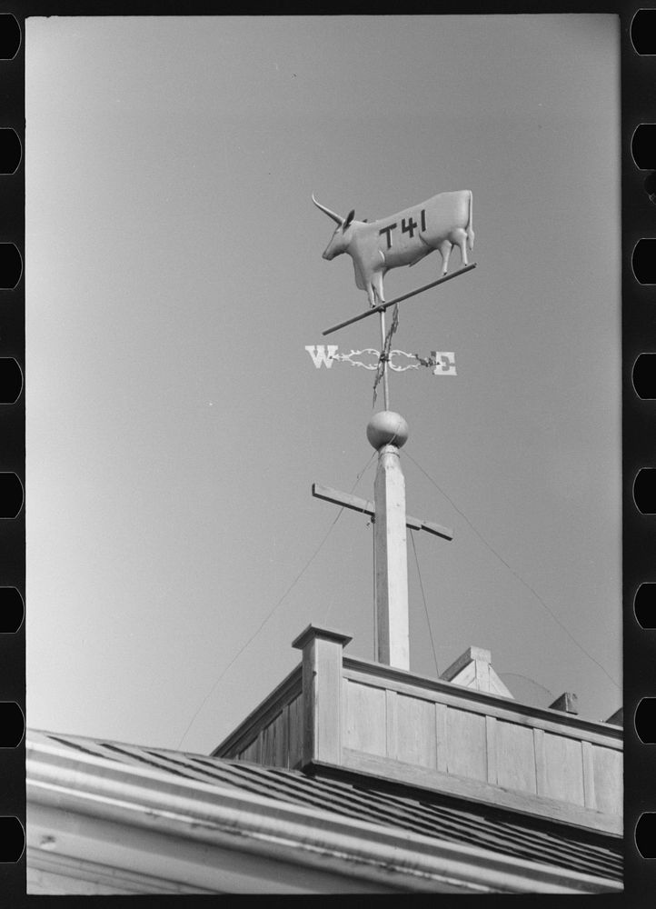 [Untitled photo, possibly related to: Weather vane with old cattle brand belonging to Dan Houston, an early settler of…