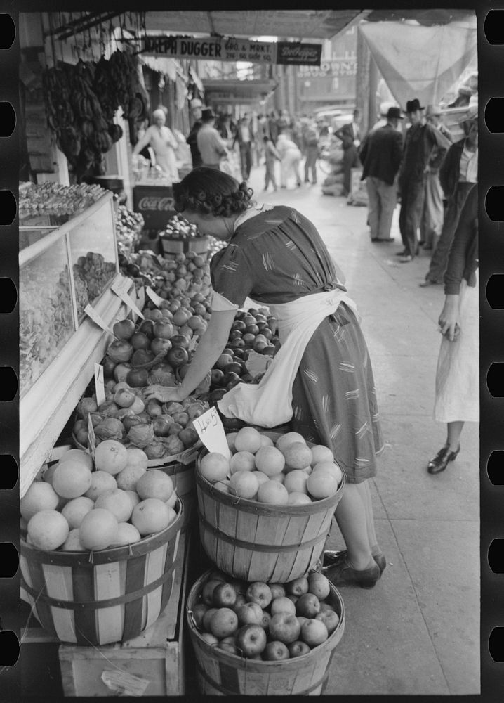 Saleswoman at grocery store, Waco, Texas by Russell Lee