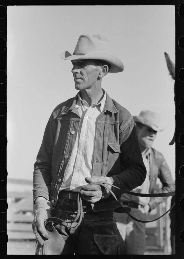 Cattlemen at stockyard, San Angelo, Texas by Russell Lee