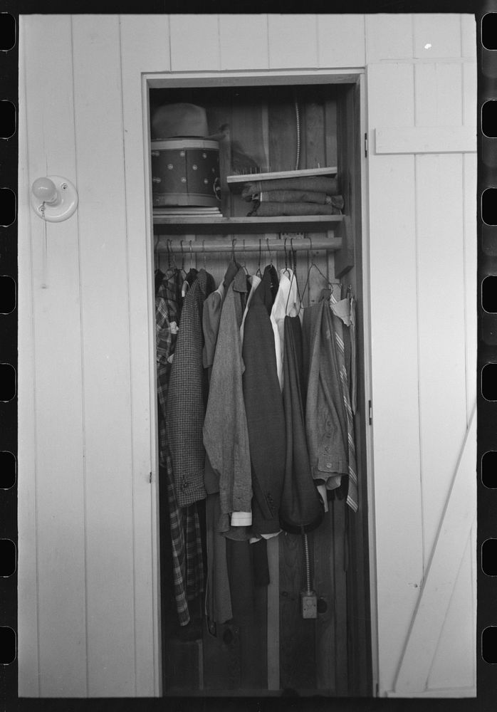 Closet space in apartment of family living and working at the Arizona Part-Time Farms, Chandler Unit, Maricopa County…