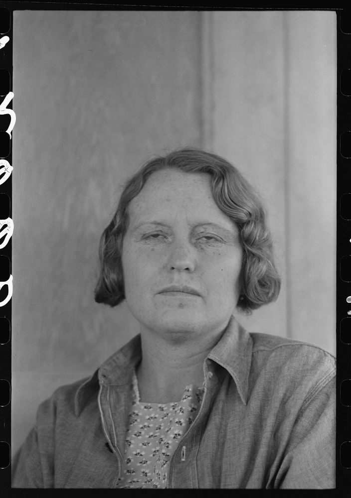 [Untitled photo, possibly related to: Wife of migratory laborer living at the Agua Fria Migratory Labor Camp, Arizona] by…