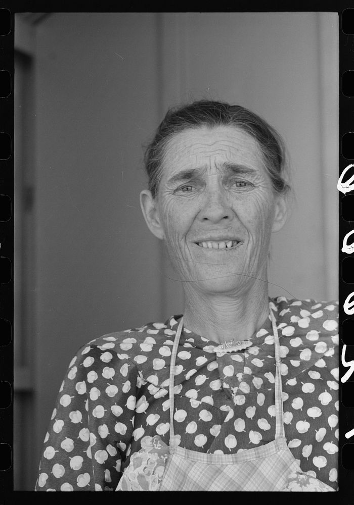 Wife of migratory worker living at the Agua Fria Migratory Labor Camp, Arizona by Russell Lee