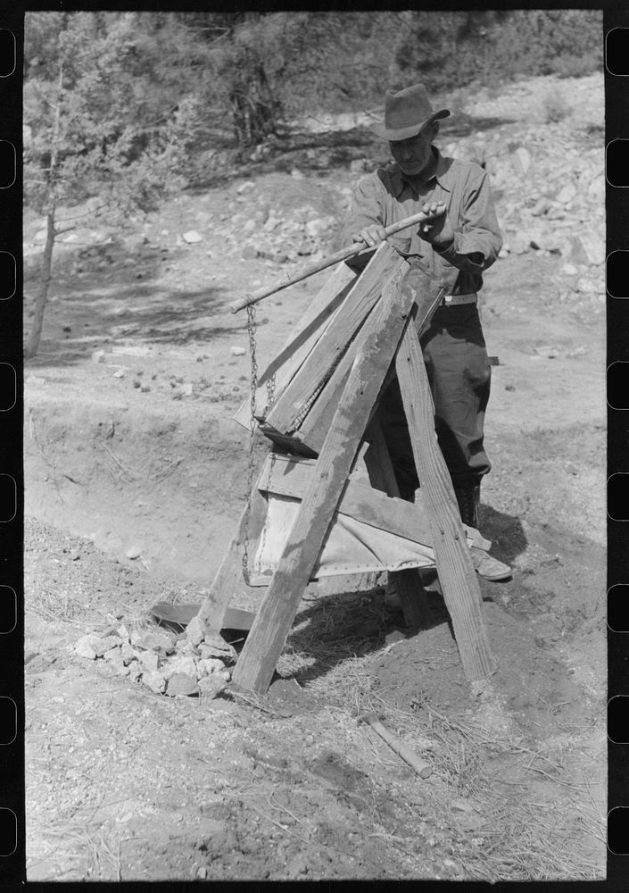 Prospector operating the papago. Pinos Altos, New Mexico by Russell Lee
