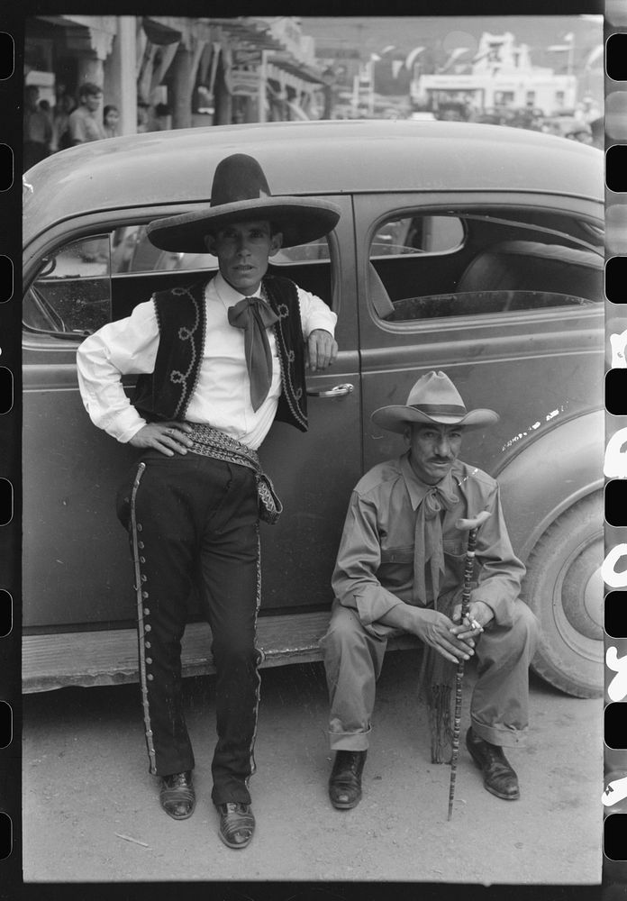Spanish-American men at fiesta, Taos, New Mexico by Russell Lee