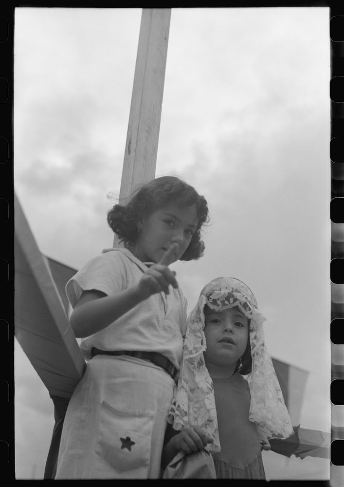 [Untitled photo, possibly related to: Spanish-American people at fiesta, Taos, New Mexico] by Russell Lee