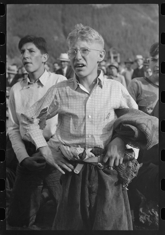 Boy watching miners contest at Labor Day celebration, Silverton, Colorado by Russell Lee