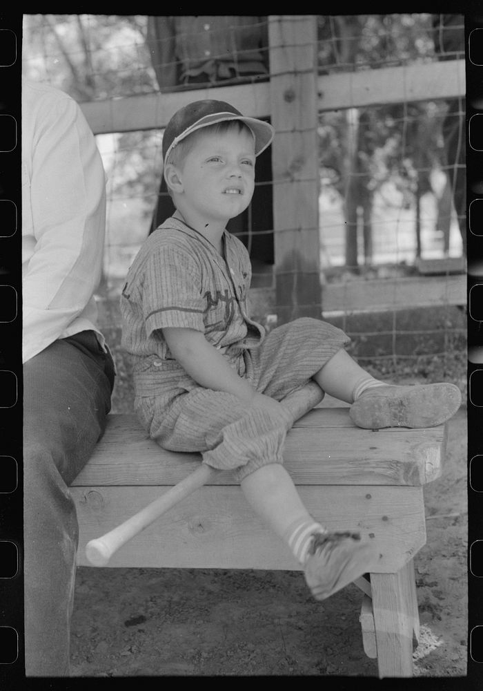 Spectators watch the baseball game on the fourth of July at Vale, Oregon by Russell Lee