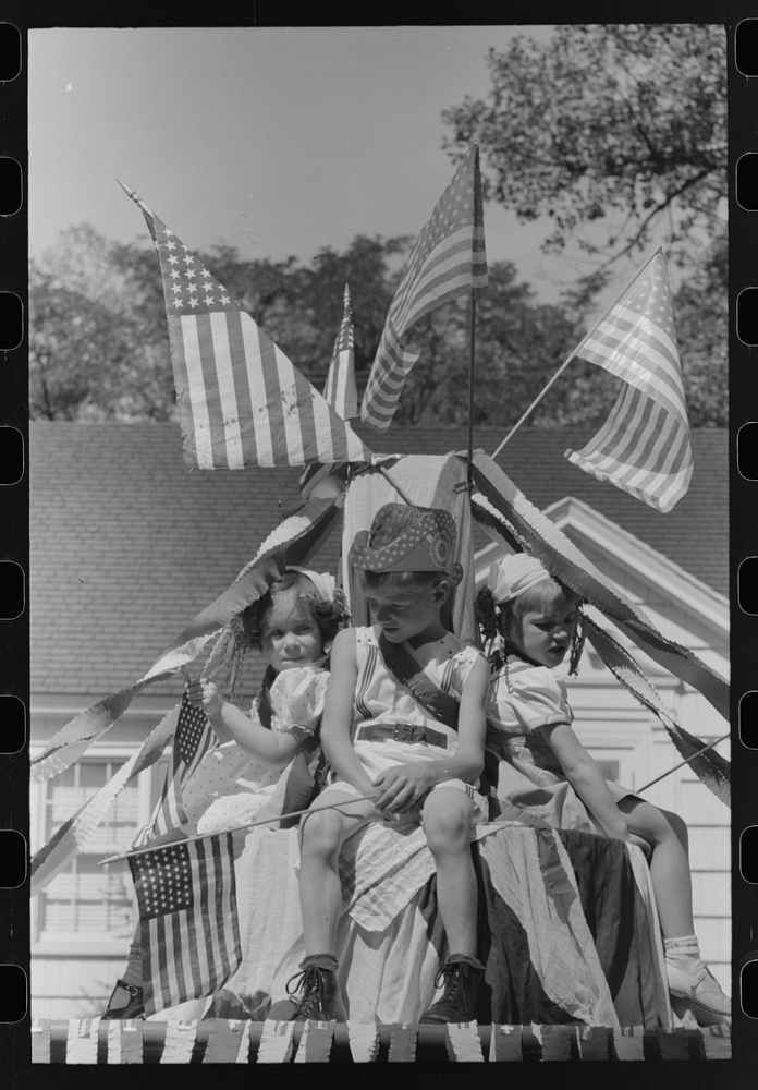 Children on float in Fourth of July parade. Vale, Oregon by Russell Lee