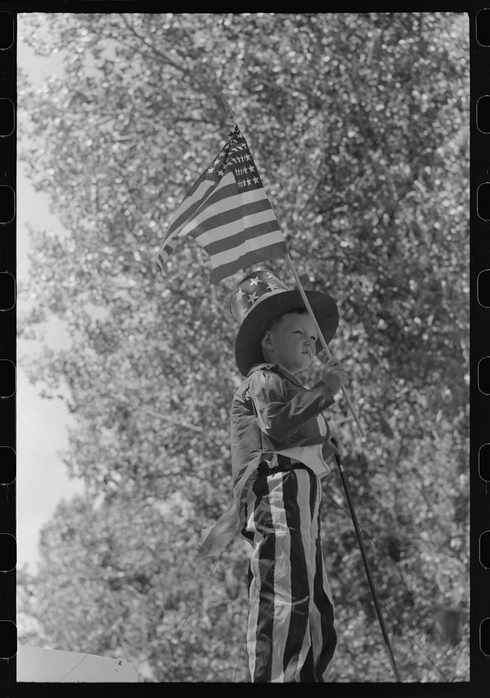 [Untitled photo, possibly related to: Boy on float in Fourth of July parade. Vale, Oregon] by Russell Lee