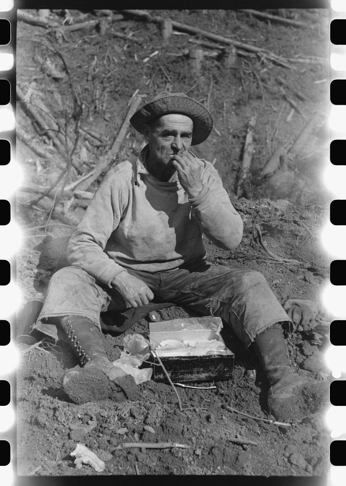 Lumberjack eats lunch. Long Bell Free Photo rawpixel