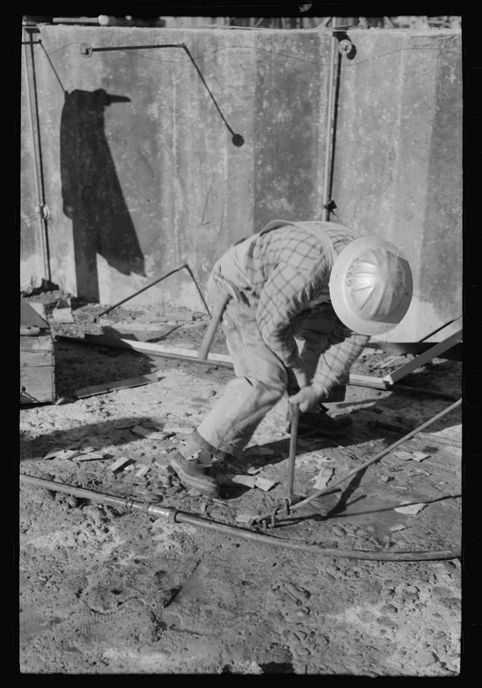Workman at Shasta Dam, Shasta County, California by Russell Lee