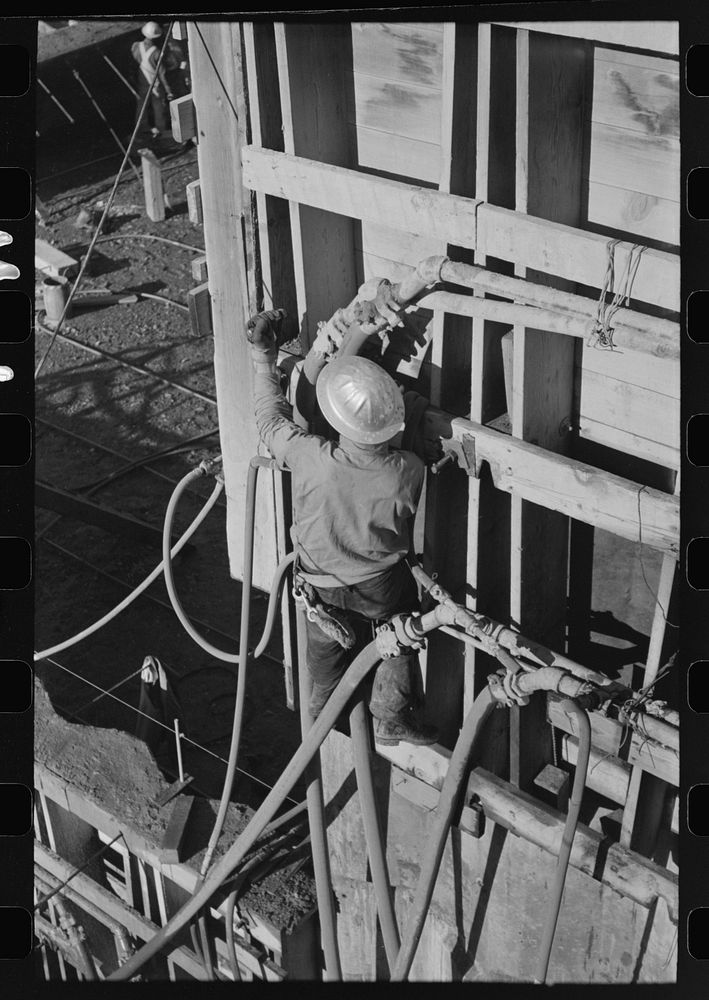 Workman working on forms for concrete at Shasta Dam, Shasta County, California by Russell Lee