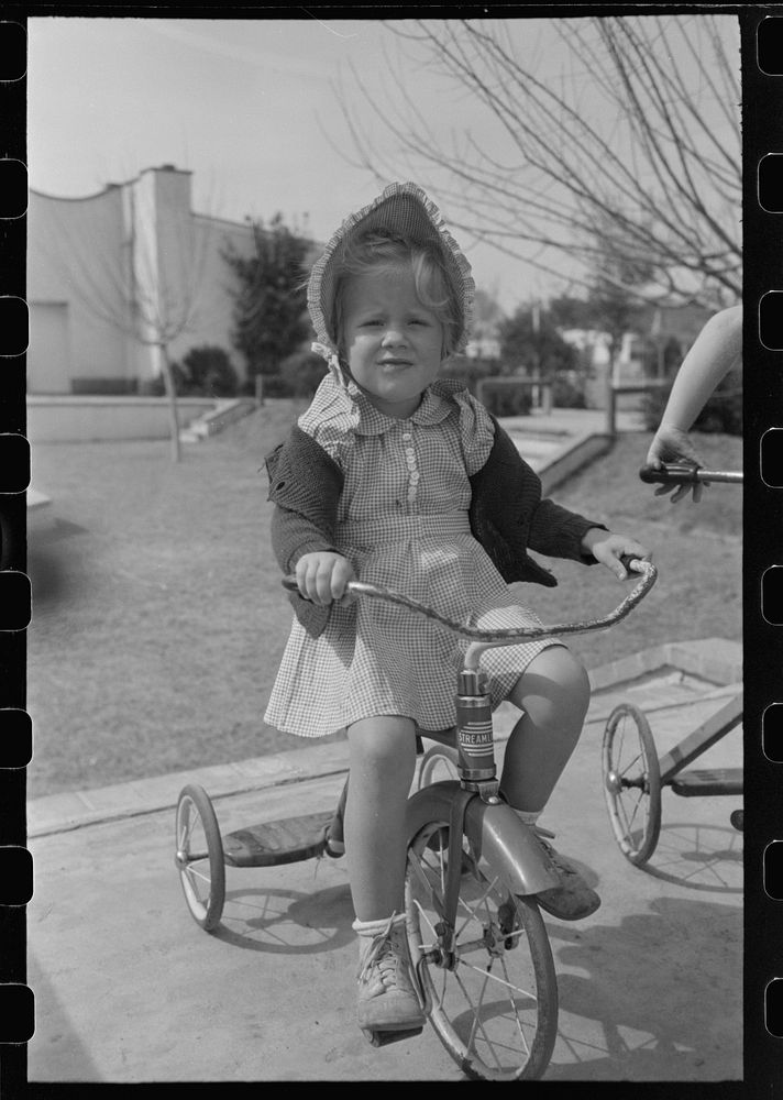 [Untitled photo, possibly related to: Little girl at the FSA (Farm Security Administration) Camelback Farms, Phoenix…