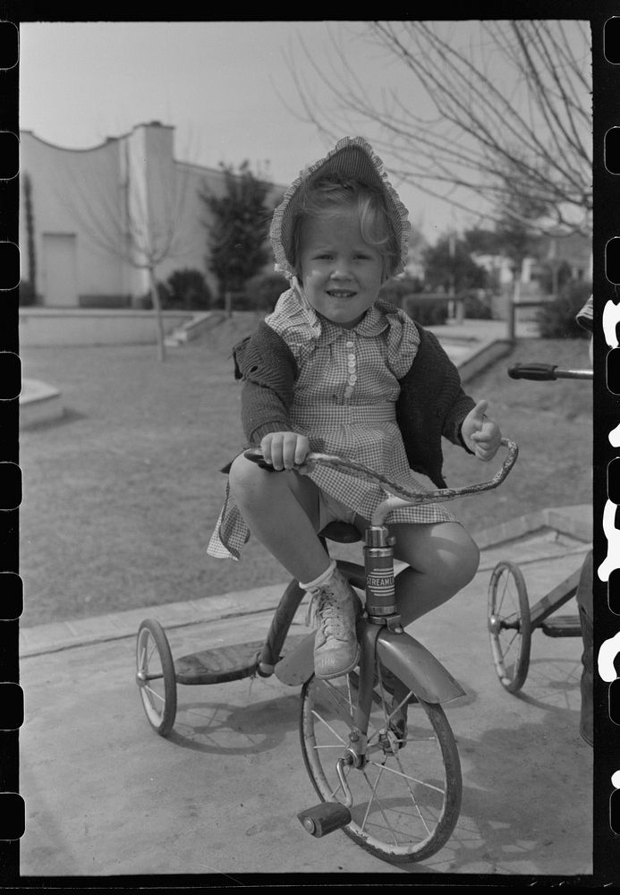 Little girl at the FSA (Farm Security Administration) Camelback Farms, Phoenix, Arizona by Russell Lee