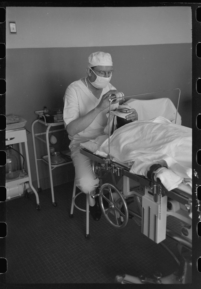 Giving anesthetic for operation at the Cairns General Hospital at the FSA (Farm Security Administration) farmworkers…