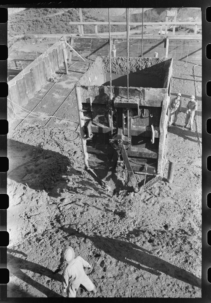 Dumping bucket of concrete in construction of Shasta Dam, Shasta County, California by Russell Lee