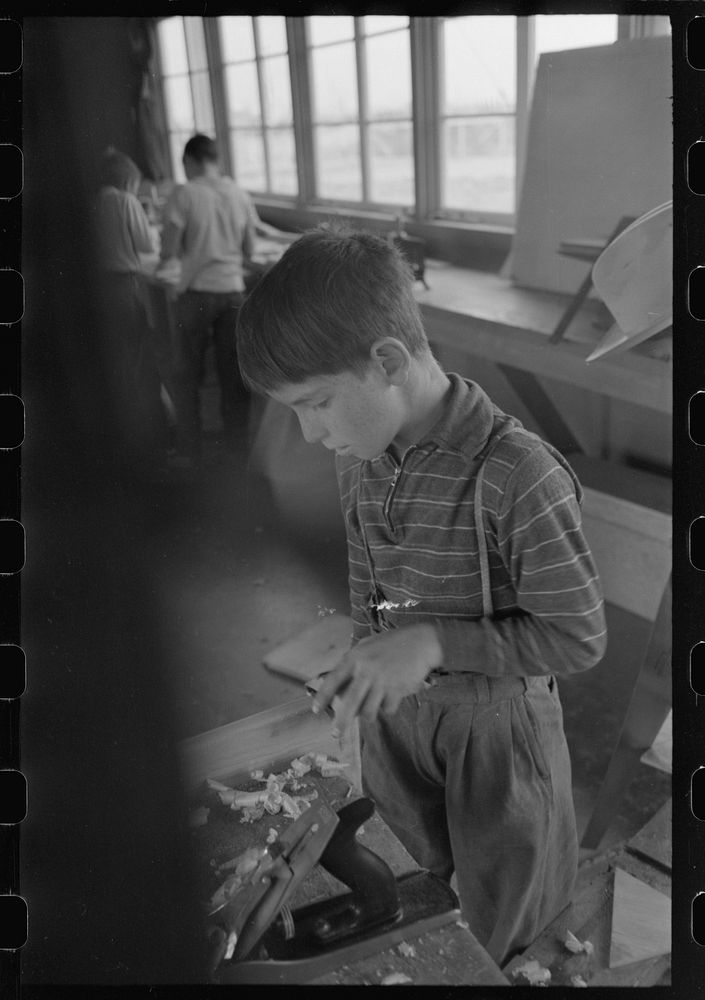 [Untitled photo, possibly related to: In the woodwork vocational training class, at the FSA (Farm Security Administration)…