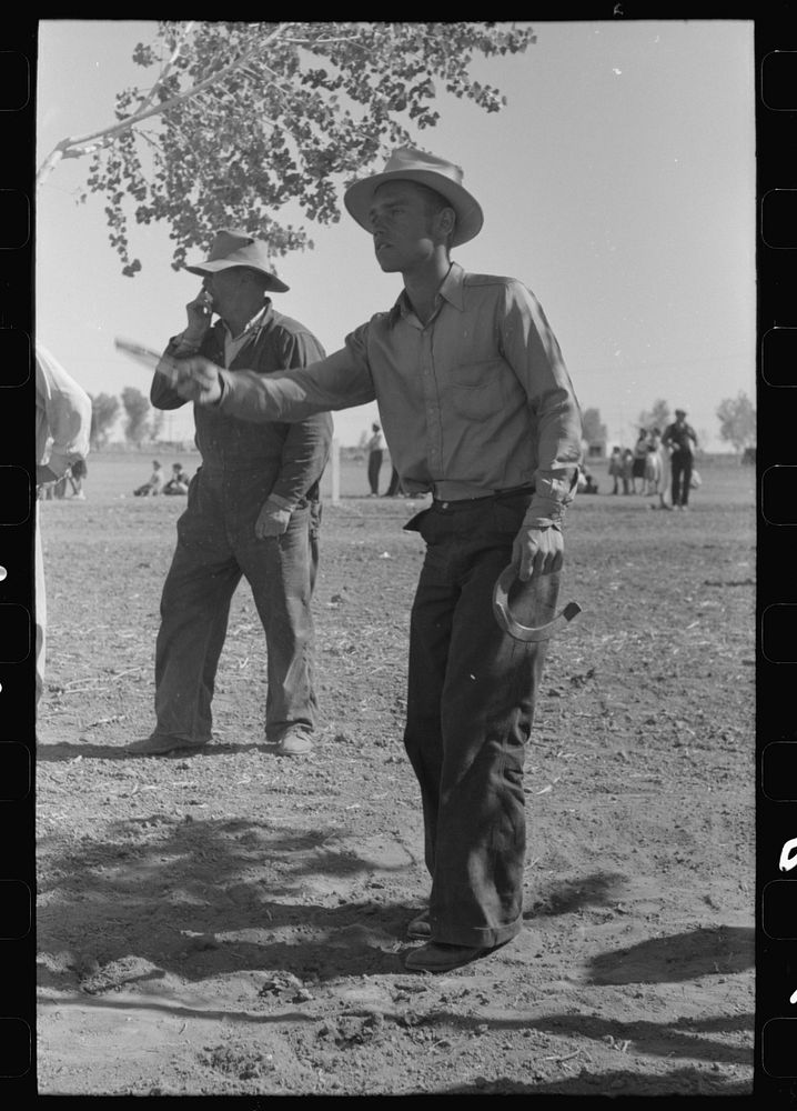 [Untitled photo, possibly related to: Horseshoe pitching contest at the annual field day of the FSA (Farm Security…