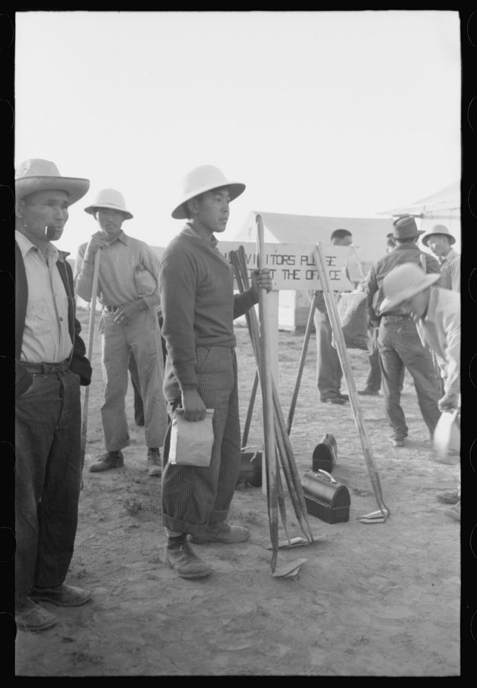 Nyssa, Oregon. FSA (Farm Security Administration) mobile camp. Japanese-American farm workers ready to leave for the fields.…