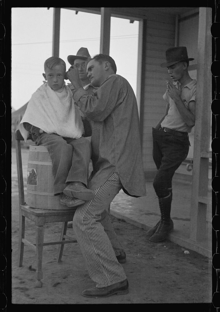 Community barber shop in Kern County migrant camp, California. Sourced from the Library of Congress.
