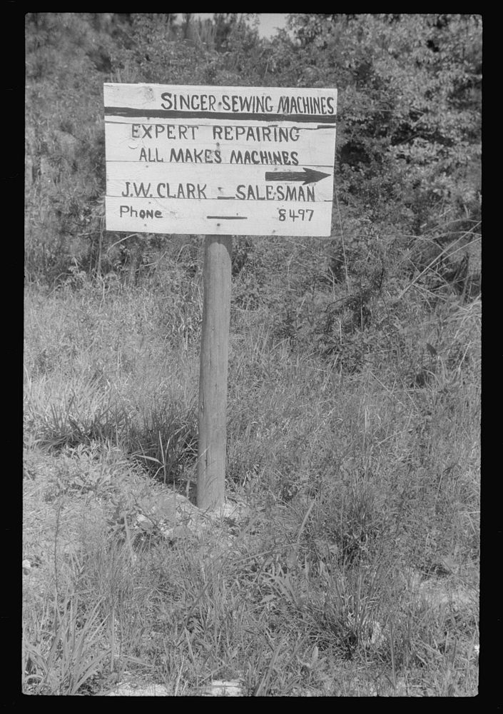 Sewing machine repair sign near Chapel Free Photo rawpixel