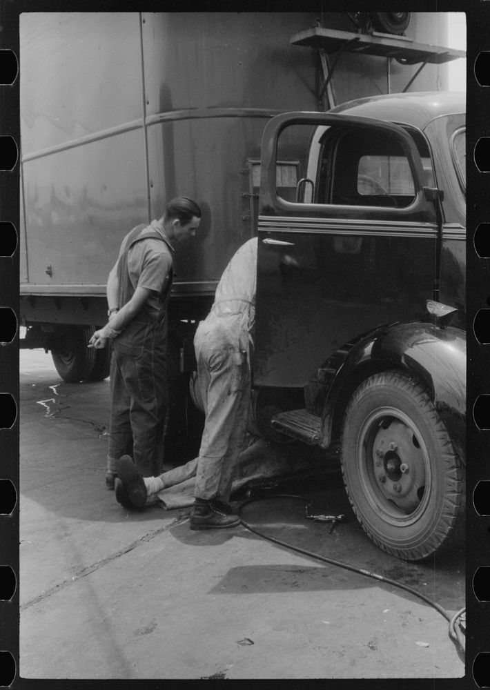[Untitled photo, possibly related to: Attendant at truck service station on U.S. 1 (New York Avenue), Washington, D.C.].…