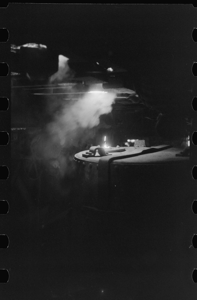 [Untitled photo, possibly related to: Tapping a furnace at the foundry of the Farrell-Binmingham Company, Ansonia…