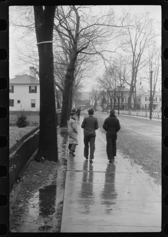 Coming home from school on a rainy day in Norwich, Connecticut. Sourced from the Library of Congress.