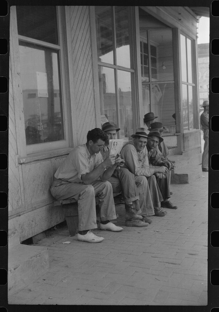 Workers, some of them unemployed, on the main street of Childersburg, Alabama. Sourced from the Library of Congress.