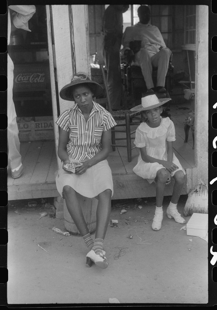 [Untitled photo, possibly related to: Saturday afternoon outside of a  store and barbershop in Union Point, Greene County…